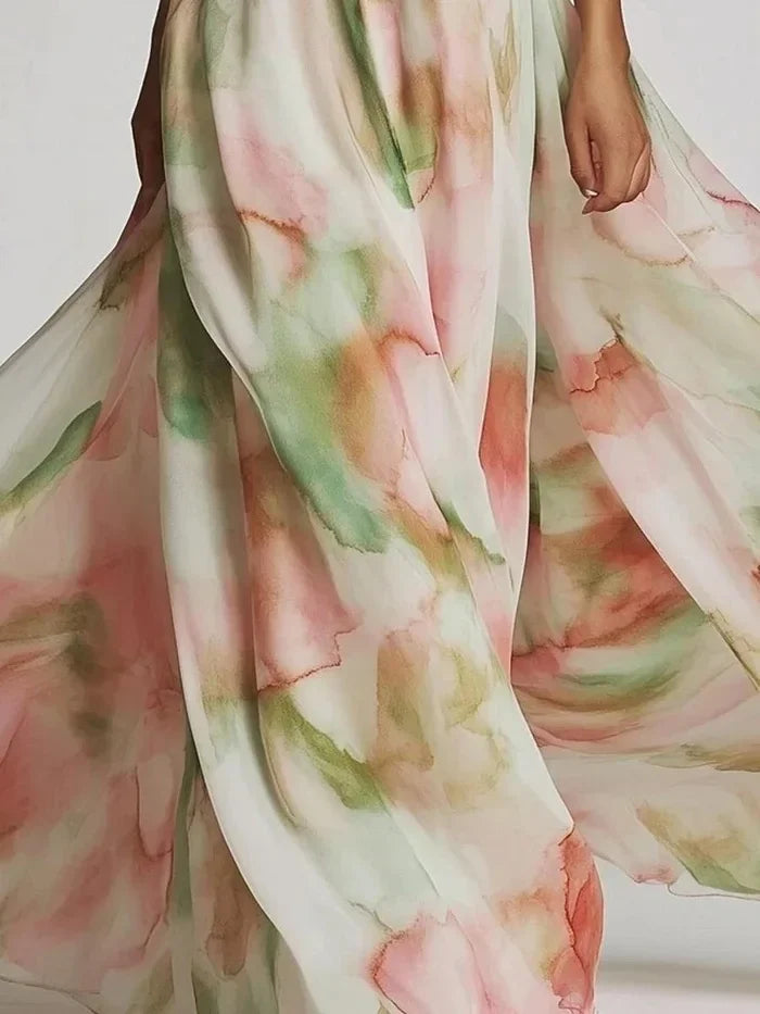 Celestina · Vestido maxi asimétrico con estampado artístico